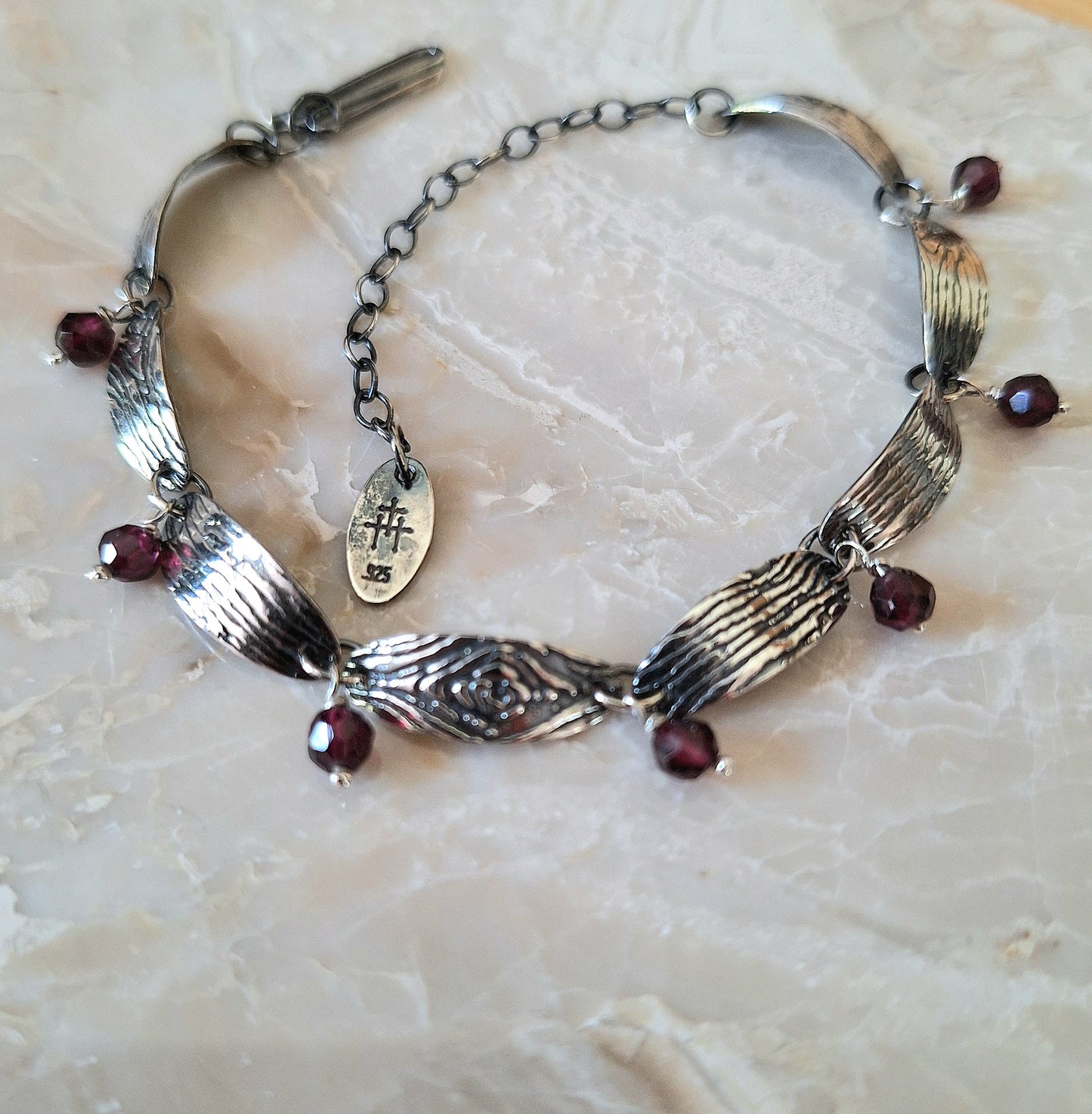 Greater Love Woodgrain Ovals & Garnet Bracelet in Sterling Silver