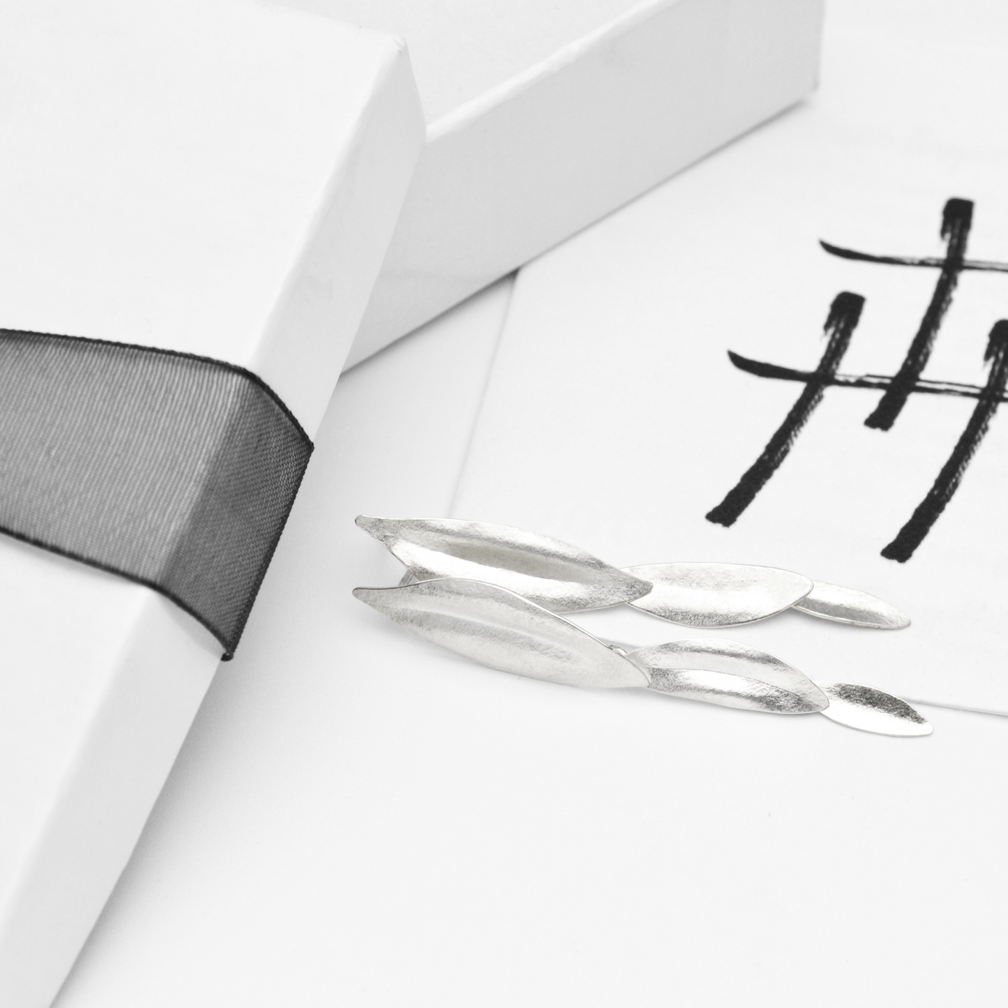 Peace Three Olive Leaf Dangle Earrings in Sterling Silver